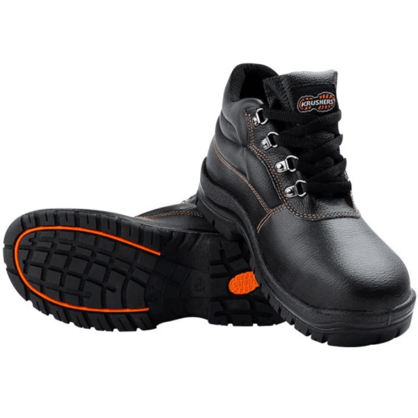 Black safety shoes with vibrant orange soles, providing both style and protection for the wearer.